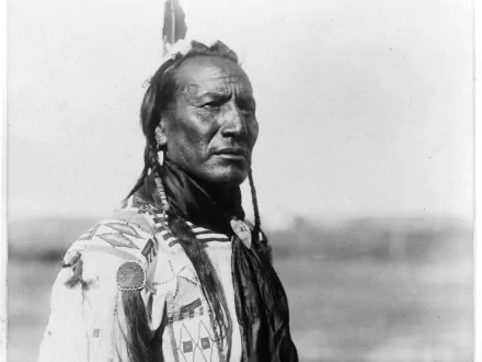 Black and white photography of a Native American man in traditional attire, captured in high definition for a PC desktop wallpaper background.