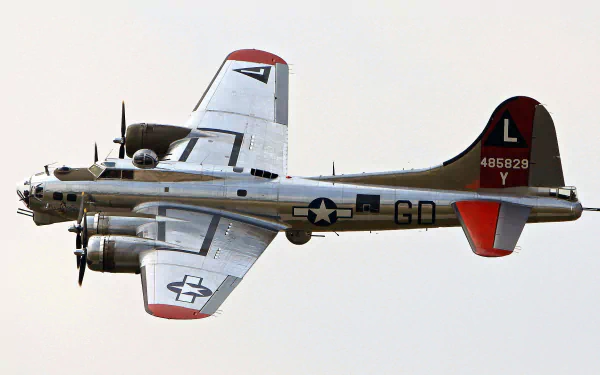 HD desktop wallpaper featuring a Boeing B-17 Flying Fortress military aircraft in flight, showcasing its iconic air force design and markings.