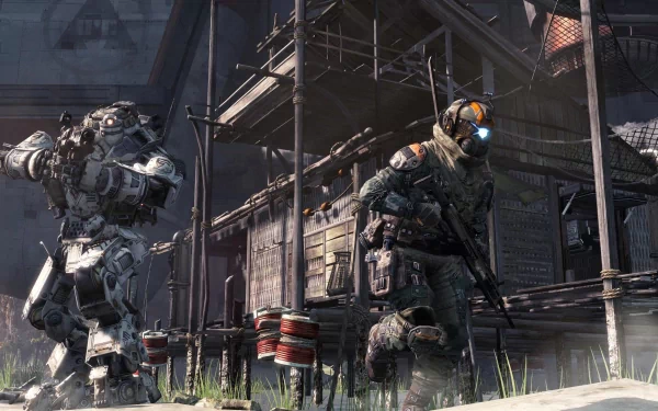 HD PC desktop wallpaper featuring intense action from the video game Titanfall, showcasing a pilot and a mech in a detailed urban combat setting.
