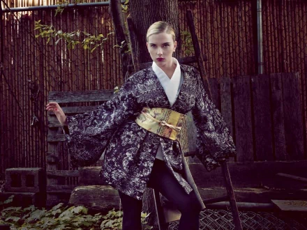 Scarlett Johansson poses elegantly in a kimono-inspired outfit, set against a rustic backdrop, featured as a high-definition PC desktop wallpaper and background.