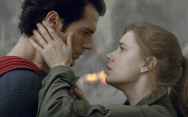 Lois Lane and Henry Cavill as Superman share an intense moment from the movie Man of Steel in this HD PC desktop wallpaper.