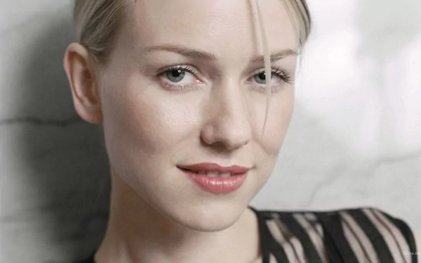 HD PC desktop wallpaper featuring a close-up portrait of celebrity Naomi Watts with a soft, neutral background.