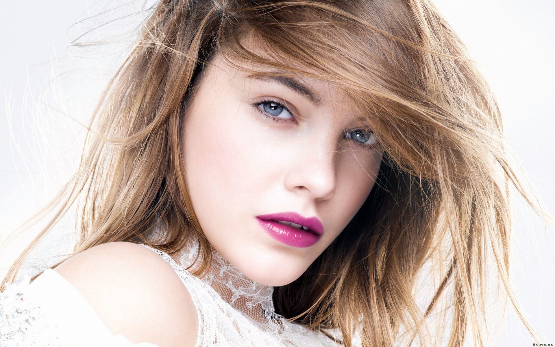 Stunning HD wallpaper featuring celebrity Barbara Palvin, showcasing her captivating gaze and flowing hair against a soft, blurred background.