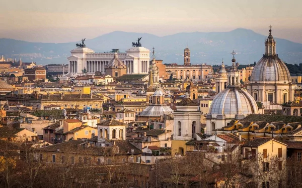 A breathtaking view of Rome's skyline, showcasing historic architecture, domes, and hills in the background. This stunning image captures the essence of the city's rich culture and history.