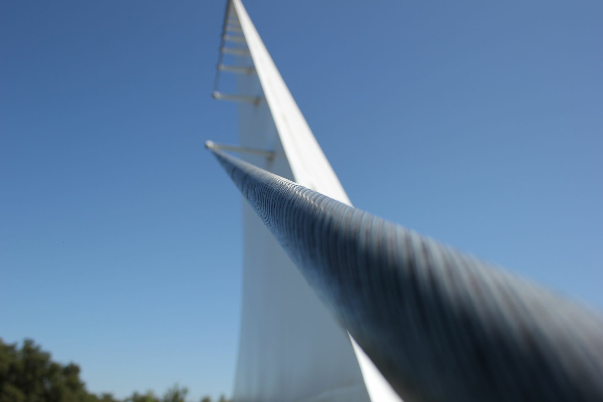 HD wallpaper featuring a modern bridge with a sleek design against a clear blue sky.