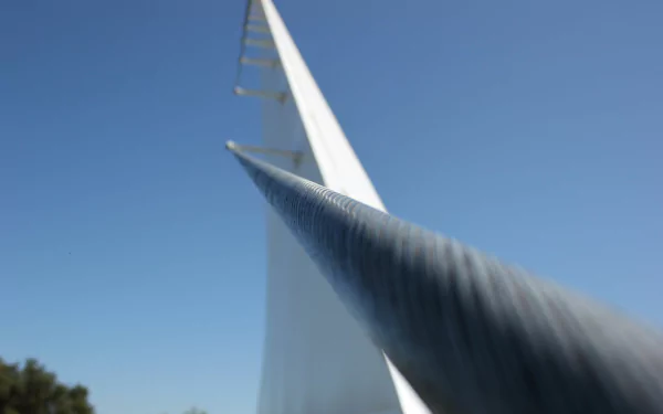 HD wallpaper featuring a modern bridge with a sleek design against a clear blue sky.