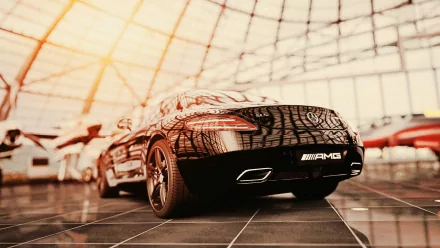 Low-angle HD PC desktop wallpaper of a glossy Mercedes‑Benz SLS vehicle in a sunlit glass showroom, reflecting the ceiling grid.