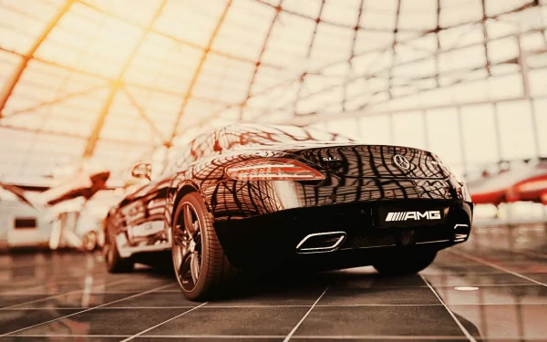 Low-angle HD PC desktop wallpaper of a glossy Mercedes‑Benz SLS vehicle in a sunlit glass showroom, reflecting the ceiling grid.