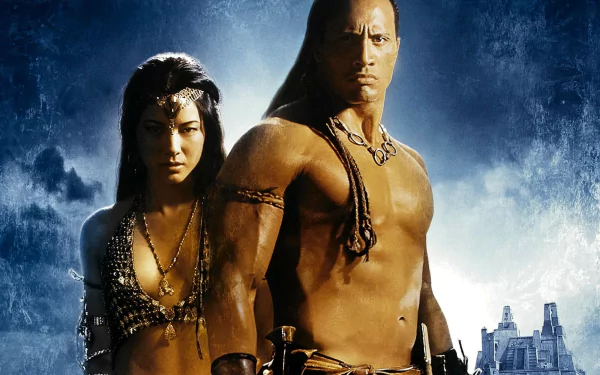 HD desktop wallpaper featuring Kelly Hu and Dwayne Johnson in their roles from the movie The Scorpion King against a dramatic blue background.