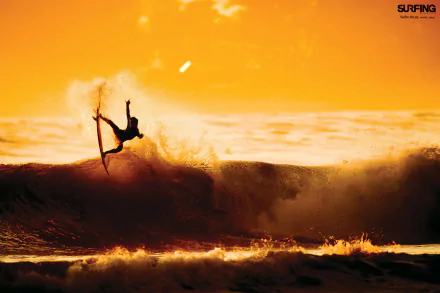 Silhouetted surfer performing an aerial trick against a vibrant sunset on a dynamic ocean wave, in a HD surfing-themed desktop wallpaper.