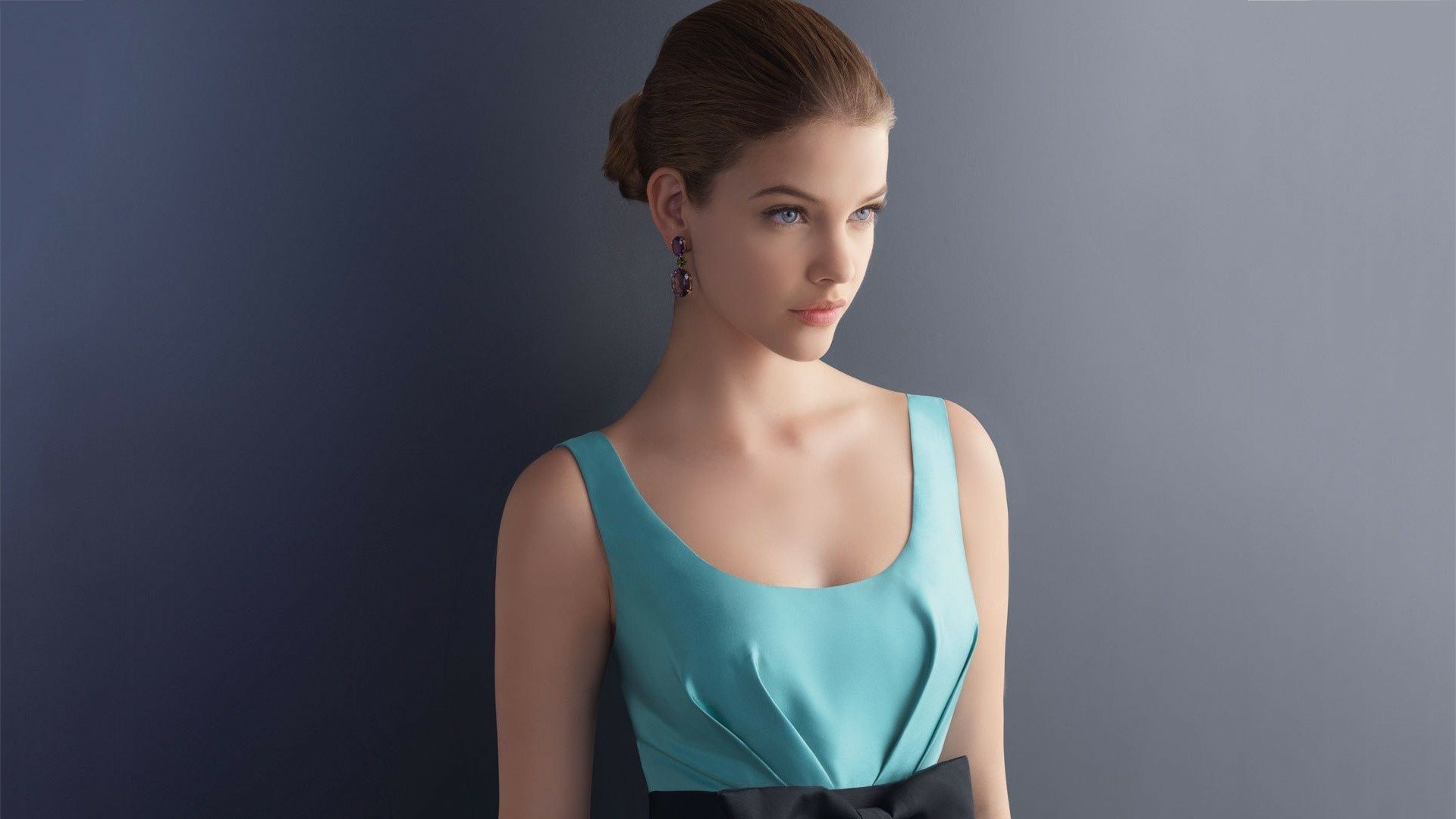 A stunning HD desktop wallpaper featuring celebrity Barbara Palvin, showcasing her elegant style in a sophisticated turquoise dress against a soft gray background.