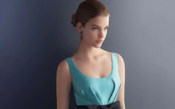 A stunning HD desktop wallpaper featuring celebrity Barbara Palvin, showcasing her elegant style in a sophisticated turquoise dress against a soft gray background.