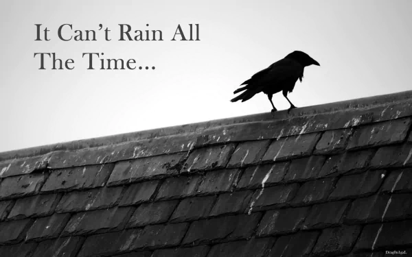 A black crow stands on a rooftop in this HD wallpaper, inspired by the movie The Crow, with the text It Can't Rain All The Time... in the background.