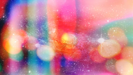 An abstract HD desktop wallpaper featuring vibrant circles and a blend of colors, creating a mesmerizing and colorful visual experience.