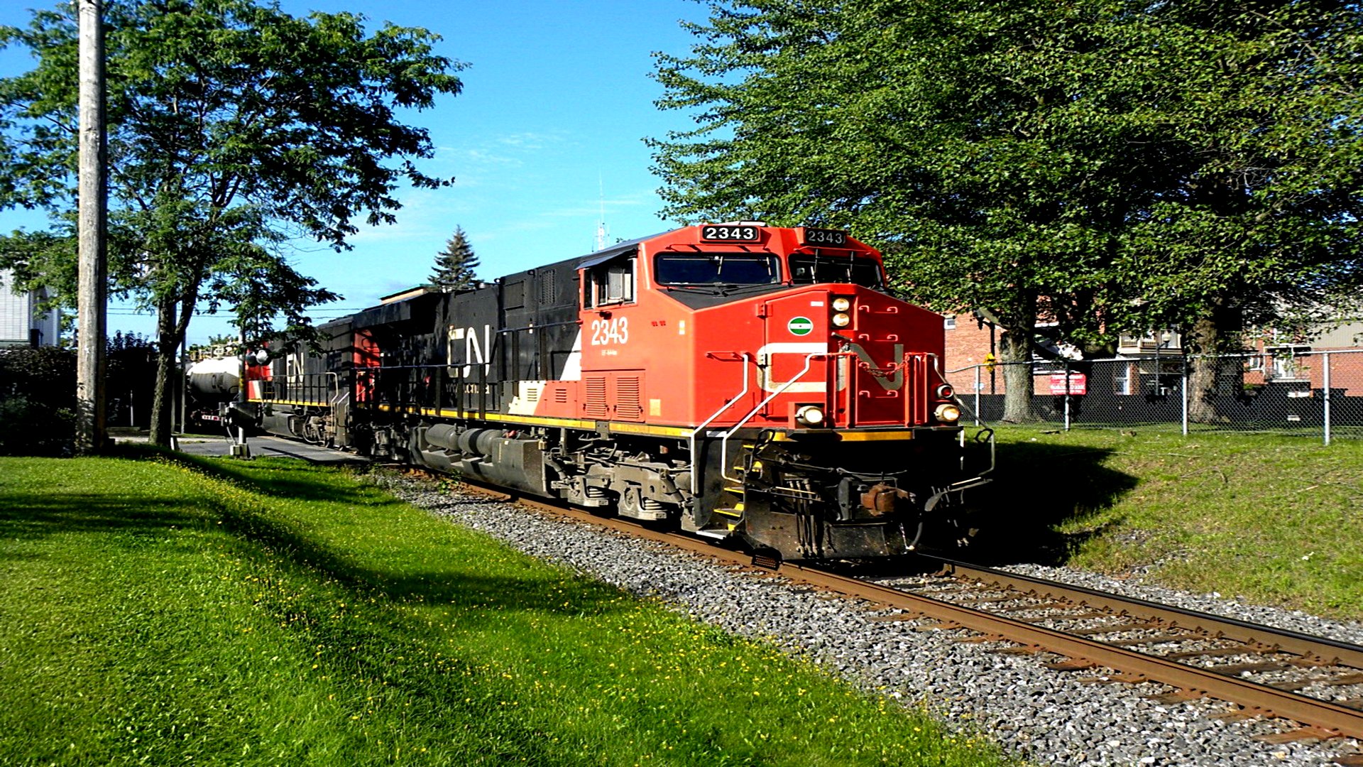 HD Scenic Train Ride: Powerful Engine on a Sunny Track