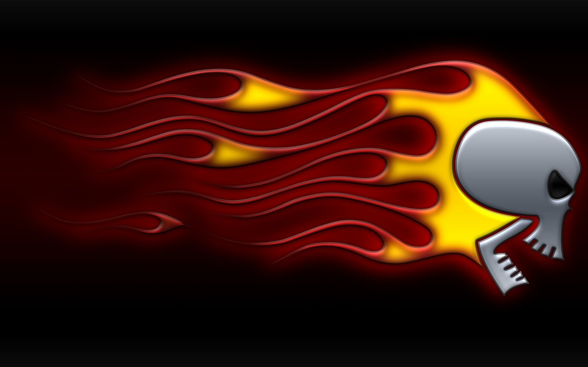 HD PC desktop wallpaper featuring a dark-themed skull with fiery flames trailing behind it on a black background.