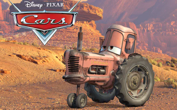 HD PC desktop wallpaper featuring the tractor character from Disney Pixar's Cars movie against a desert canyon backdrop.