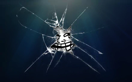 A humorous meme depicting a broken glass effect with a mischievous face in the center, designed as a high-definition desktop wallpaper.