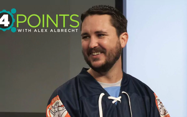 HD wallpaper featuring a man with a beard smiling, wearing a sports jersey, in front of a 4 Points with Alex Albrecht backdrop.