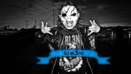 A striking black-and-white image of DJ BL3ND wearing a mask and metal spikes, embodying the energy of remix and electro house music, set against an urban backdrop.