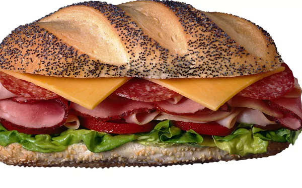 A delicious sandwich stacked with layers of deli meats, cheese, and fresh lettuce, presented as a high-definition PC desktop wallpaper and background.