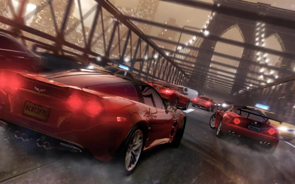 HD PC desktop wallpaper of The Crew video game: convoy of red sports cars racing across a rain-slicked bridge at night, motion blur and glowing city lights.