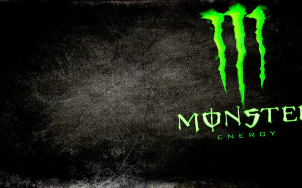 HD PC desktop wallpaper featuring the bright green Monster Energy logo on a textured dark background, showcasing a bold, man-made design.