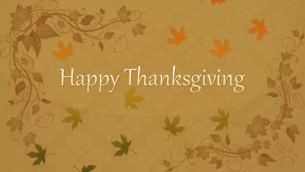 HD PC desktop wallpaper featuring Happy Thanksgiving text with autumn leaves and decorative floral accents, celebrating the Thanksgiving holiday.