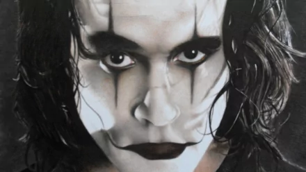 HD desktop wallpaper featuring Brandon Lee as the Crow character from the movie The Crow, with iconic dark makeup and intense gaze.