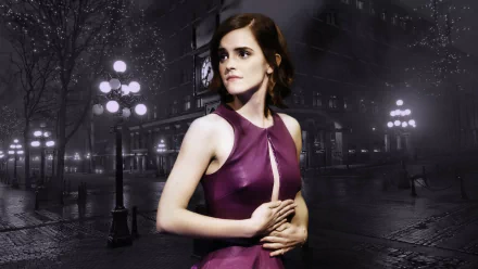 Emma Watson poses elegantly in a striking purple dress, set against a moody, dimly lit urban backdrop. This HD wallpaper captures her poise and captivating presence.