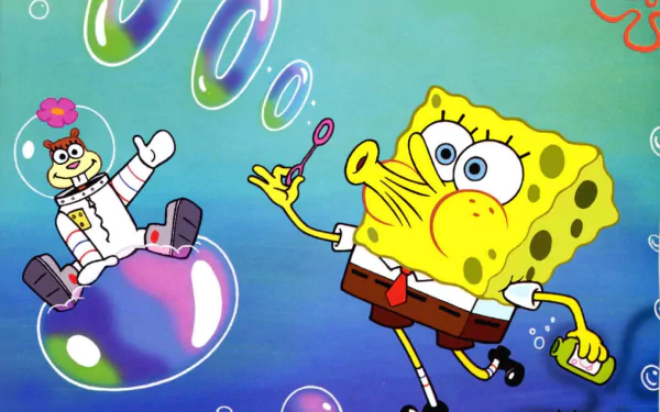 A vibrant HD desktop wallpaper featuring SpongeBob SquarePants blowing bubbles, with Sandy Cheeks floating in a bubble, capturing the fun spirit of the beloved TV show.
