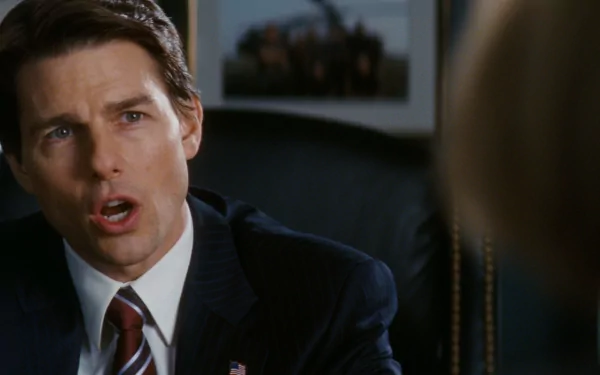 Cinematic close-up of a man in a suit mid-speech in an office; still from the movie Lions for Lambs, formatted as an HD PC desktop wallpaper/background.