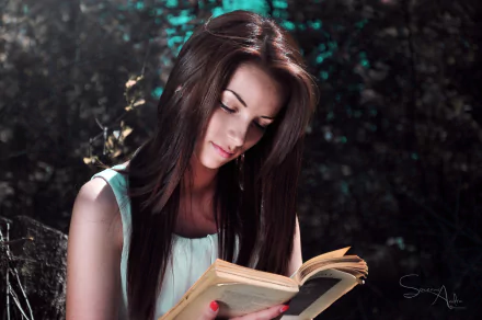 A serene woman with long dark hair reads a book outdoors, captured in a 4K Ultra HD PC desktop wallpaper that evokes a calm, reflective mood.