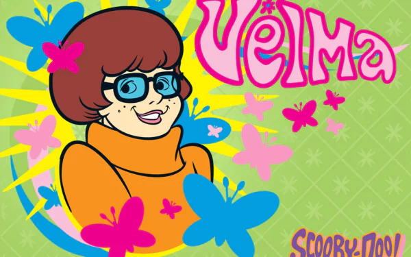 An HD desktop wallpaper featuring Velma from Scooby-Doo, surrounded by colorful butterflies and vibrant graphics, capturing the playful spirit of the beloved TV show.