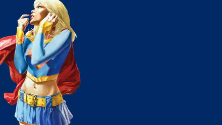 HD PC desktop wallpaper: Supergirl from the Final Crisis comic — blonde in blue-and-red costume with flowing cape, cropped left against a solid deep-blue background.