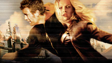 HD PC desktop wallpaper from the movie The Island: a man and woman in a tense action pose, sprinting past a gritty, dystopian cityscape.