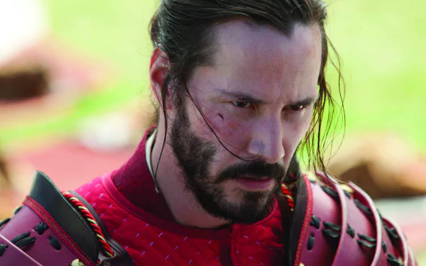HD wallpaper of a scene from 47 Ronin featuring a close-up of a character in a red armor suit, suitable as a desktop background.