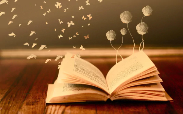 An enchanting HD desktop wallpaper featuring an open fantasy book with butterflies and flowers emerging from its pages, set on a wooden surface.