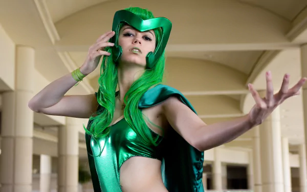 HD PC wallpaper featuring a woman cosplaying Polaris from Marvel Comics, wearing a metallic green costume and striking a dynamic pose indoors.