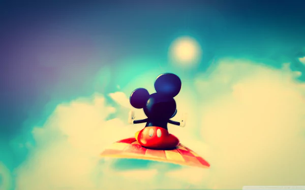 A vibrant HD desktop wallpaper featuring Mickey Mouse soaring through colorful clouds, capturing the whimsical charm of Disney movies.