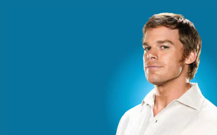 HD PC desktop wallpaper for the TV show Dexter: head-and-shoulders portrait of the show's protagonist against a bright teal-blue background.