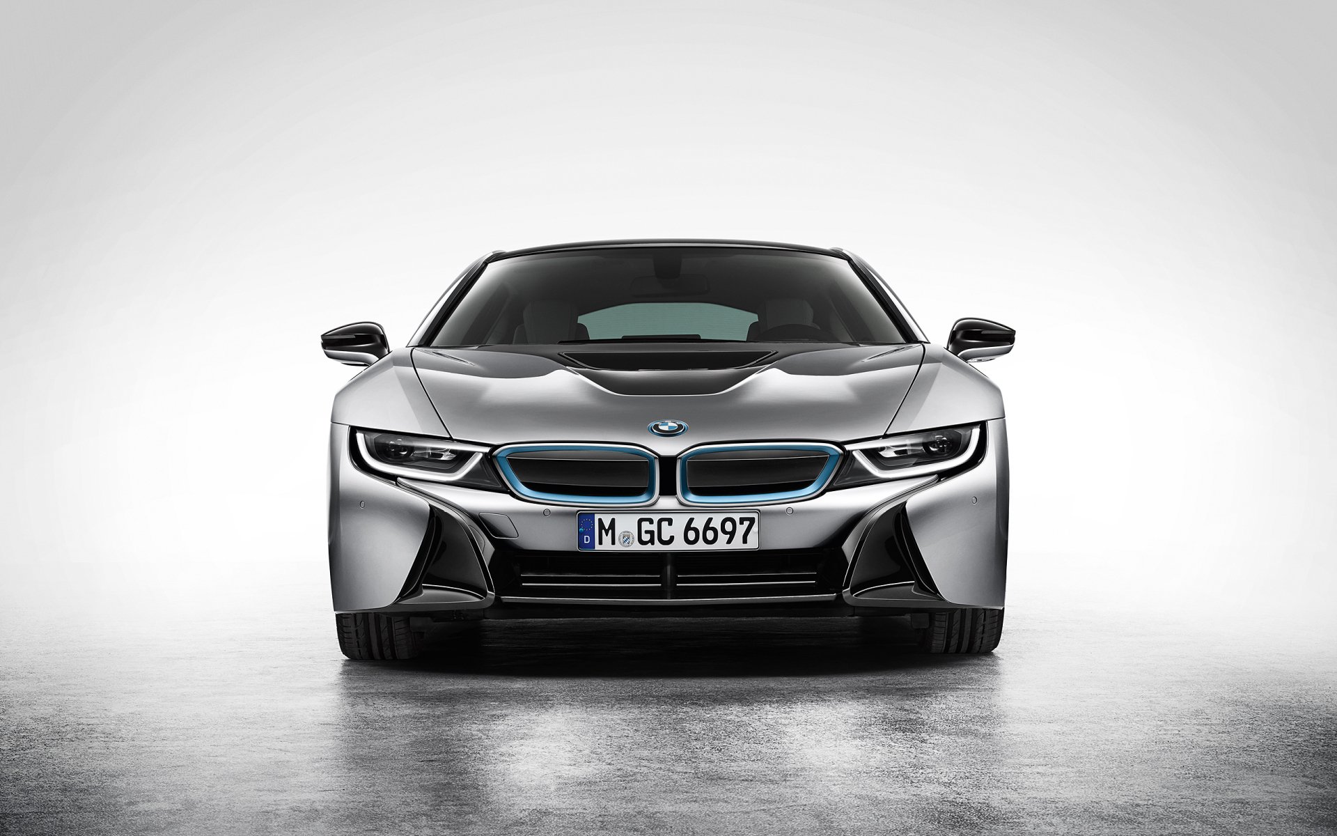 Front view of a metallic BMW i8 sports vehicle centered on a minimal gray background — 2K Quad HD PC desktop wallpaper and background.
