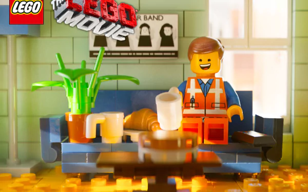 HD desktop wallpaper featuring the character Emmet lounging on a couch with The Lego Movie logo in the background.