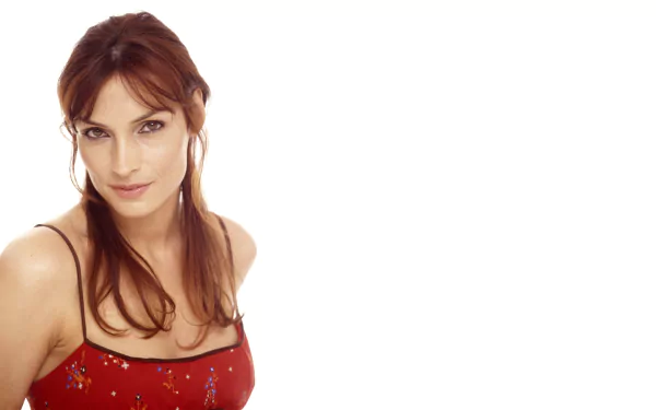 Dutch actress Famke Janssen poses against a white background in this HD PC desktop wallpaper and background image.