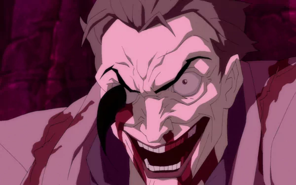 HD PC desktop wallpaper featuring a close-up of the Joker's menacing face from the movie Batman: The Dark Knight Returns.