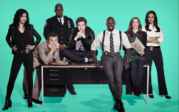 HD desktop wallpaper of 'Brooklyn Nine-Nine' cast posing against a teal background.