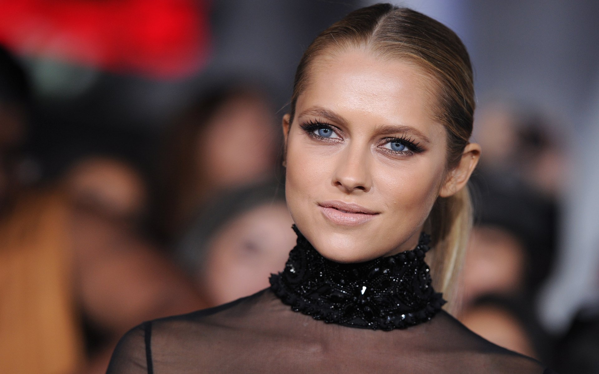 HD desktop wallpaper featuring Australian actress and celebrity Teresa Palmer with sleek hair and a black high-neck outfit at a formal event.
