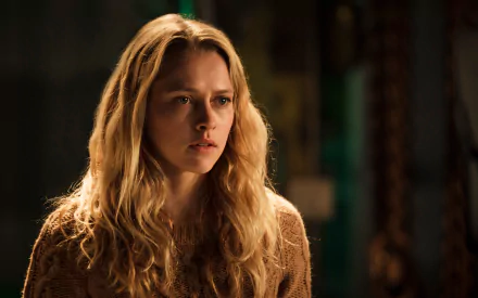 Teresa Palmer, an Australian actress, is captured in a moment of intensity, showcasing her expressive features in this engaging HD desktop wallpaper.