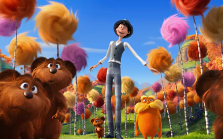 The Once-ler from The Lorax movie stands smiling with the Lorax and Bar-ba-loots amid colorful Truffula trees — 2K Quad HD PC desktop wallpaper background.