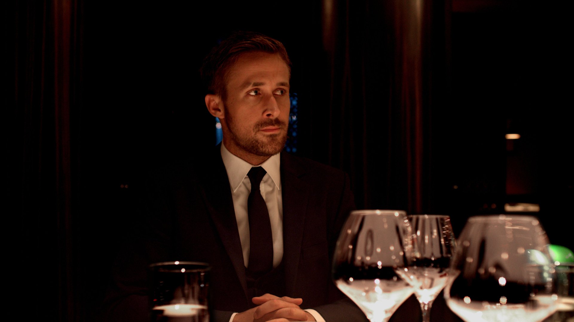 Ryan Gosling in a dark, moody scene from the movie Only God Forgives, featured in a 4K Ultra HD PC desktop wallpaper and background.